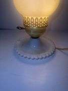 Vintage milk glass table lamp with a ruffled base