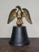 Vintage Cast Iron Bell topped with a patriotic Brass Eagle