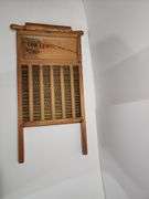 Washboard with mini rolling pin attached