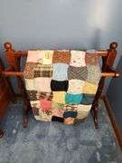 Handmade multicolored quilt & cherry quilt stand