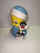Vintage Looney Tunes Tweety Bird and Sylvester ceramic cookie jar by Gibson.