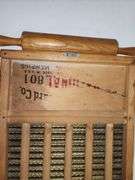 Washboard with mini rolling pin attached
