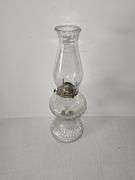 Clear glass oil lamp with fluted or ribbed pattern base & clear glass chimney