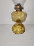 Oil lamp with amber-colored glass with a textured, "bubble" with clear glass chimney