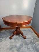 Pedistal side table with claw feet