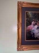 Ladies print in gold colored frame