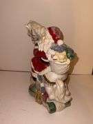 Santa on rocking horse - made in China