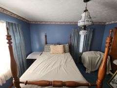 Wooden four-poster full size bed & bedding