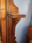 Victorian Eastlake walnut dresser with a marble top and a mirror.