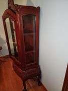 Carved orie tal style curio or china display cabinet.