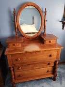 Cherry dresser with oval mirror