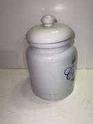 Vintage white ceramic cookie jar .