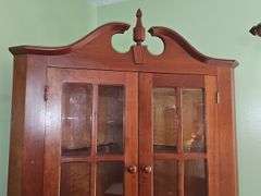 Colonial-style corner hutch or cupboard