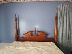 Wooden four-poster full size bed & bedding