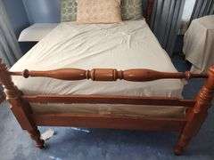 Wooden four-poster full size bed & bedding