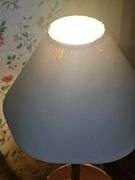 Empire-style brass and ebonized candlestick buffet lamp.