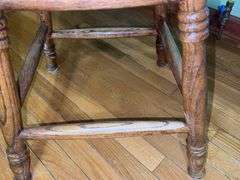 Vintage solid wood swivel bar stool.