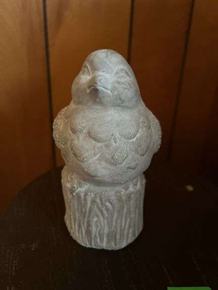 Small shelf and concrete bird