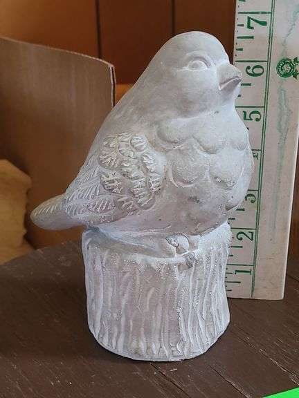 Small shelf and concrete bird