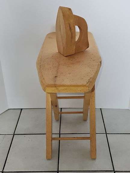 Wooden child's ironing board and iron
