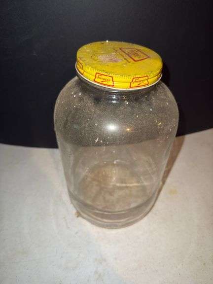 Vintage jar with Fischers yellow lid