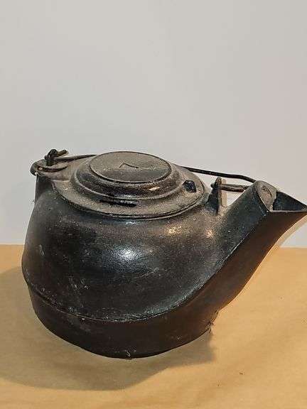 Vintage cast iron tea kettle