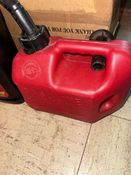 Gas can, Antifreeze,  & box of misc items.