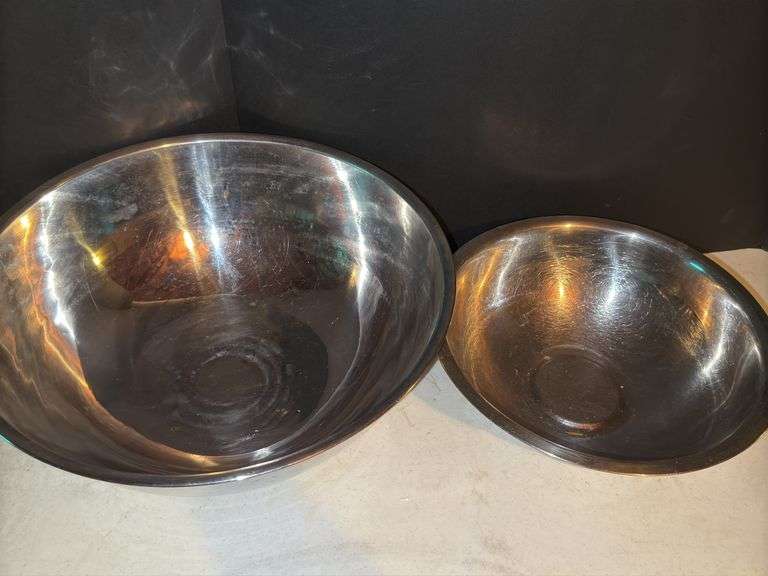 Large mixing bowls and cookbook.