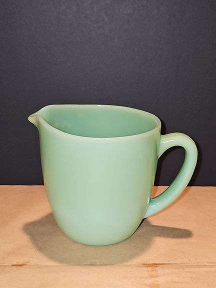 Vintage Fire King Jadeite milk pitcher.