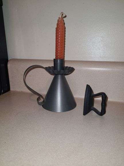 Cast mini iron and tin candle holder with honeycomb candle.