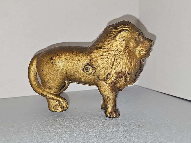 Heavy metal lion figure