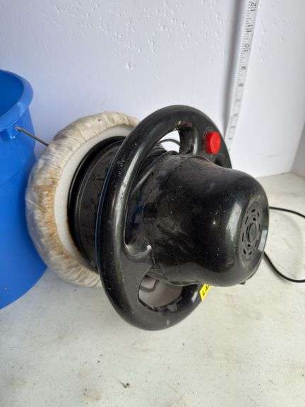 Car buffer in blue bucket