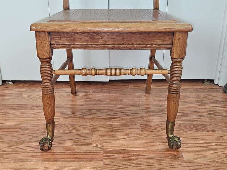 Wooden Chair with Antique Claw Legs.