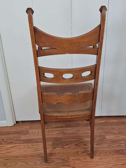 Wooden Chair with Antique Claw Legs.