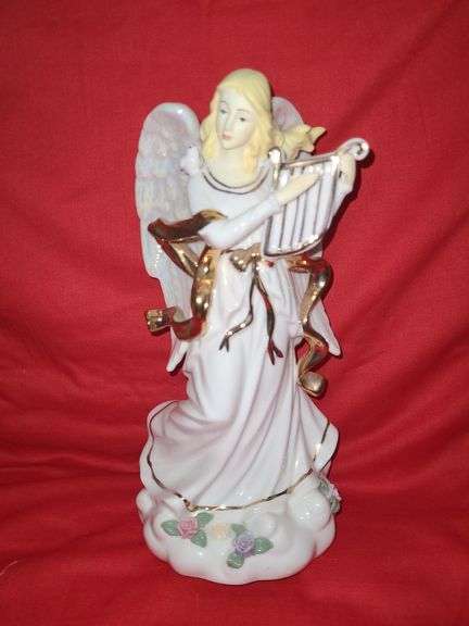 4 angel figures