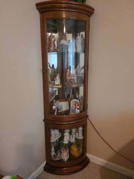 Lighted corner curio cabinet
