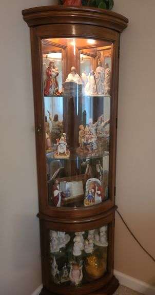 Lighted corner curio cabinet