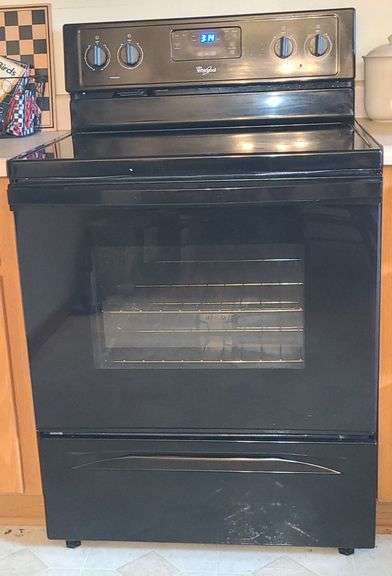 Whirlpool glass top stove.