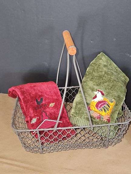 Metal egg basket with farm style linens, and birdhouse.