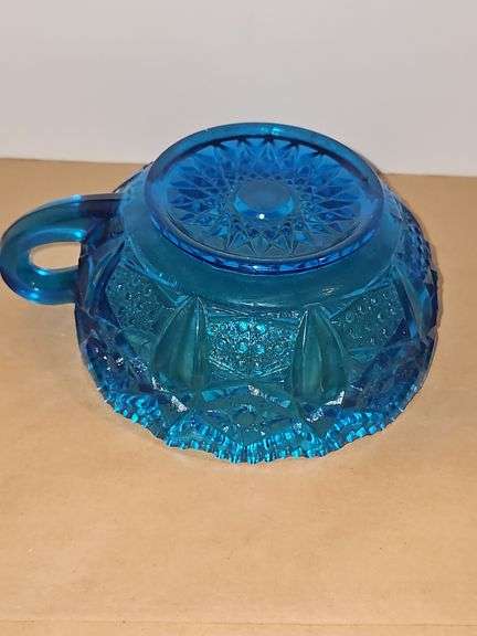 Vintage Blue Glass nappy handled bowl Sawtooth rim