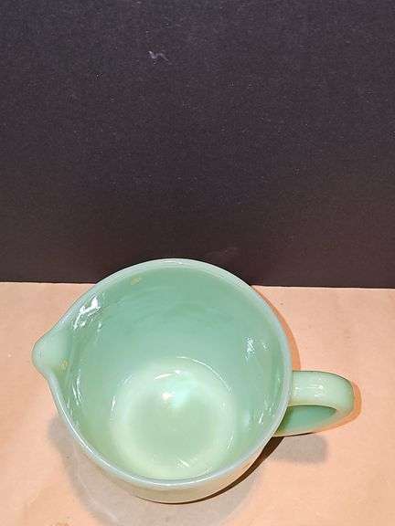 Vintage Fire King Jadeite milk pitcher.
