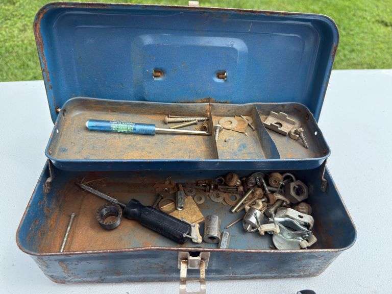 Small vintage metal toolbox and contents.