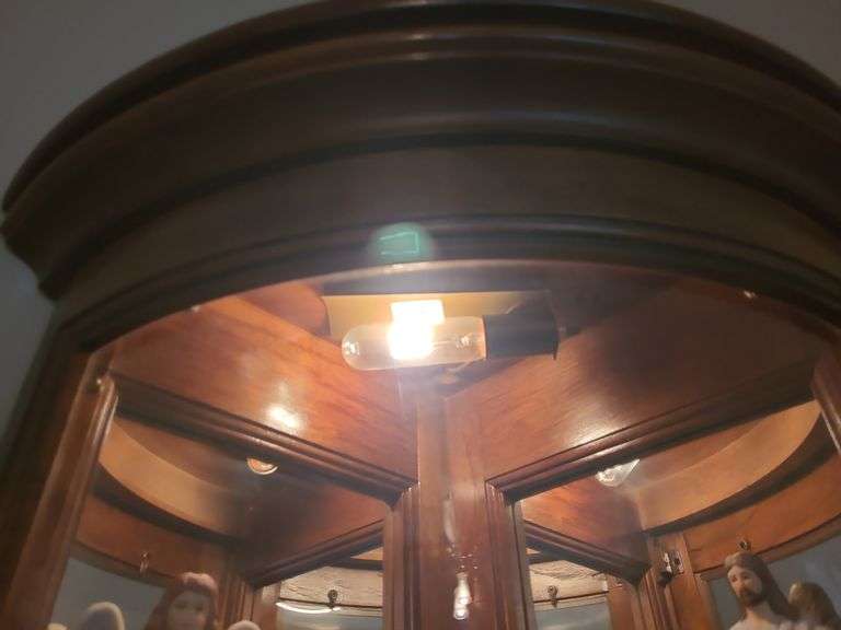 Lighted corner curio cabinet