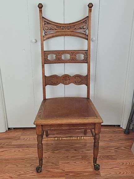 Wooden Chair with Antique Claw Legs.