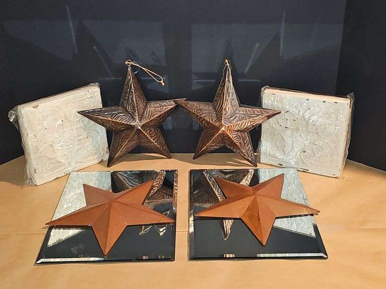 Metal stars, wooden square decor, & display mirrors.