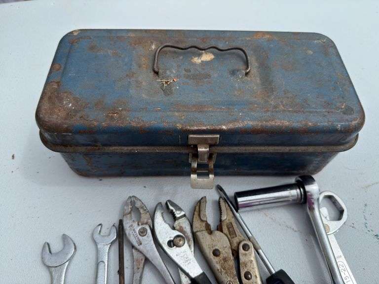Small vintage metal toolbox and contents.