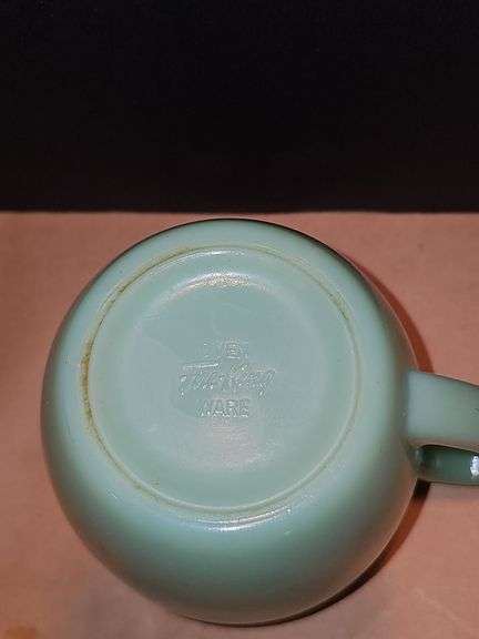 Vintage Fire King Jadeite milk pitcher.