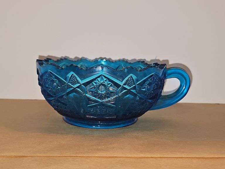 Vintage Blue Glass nappy handled bowl Sawtooth rim