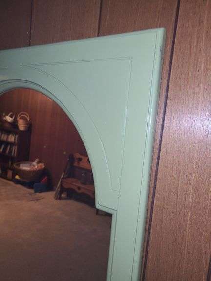 Mirror with green frame