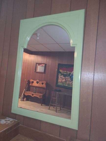 Mirror with green frame